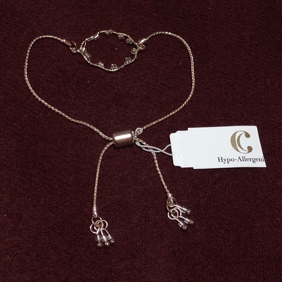 Charming Charlie Jewelry - Dainty Rose Gold tone Charming Charlie Bracelet